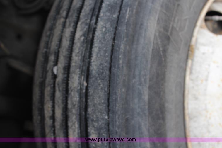 image for item H1377 2007 Freightliner Business Class M2 rollback truck