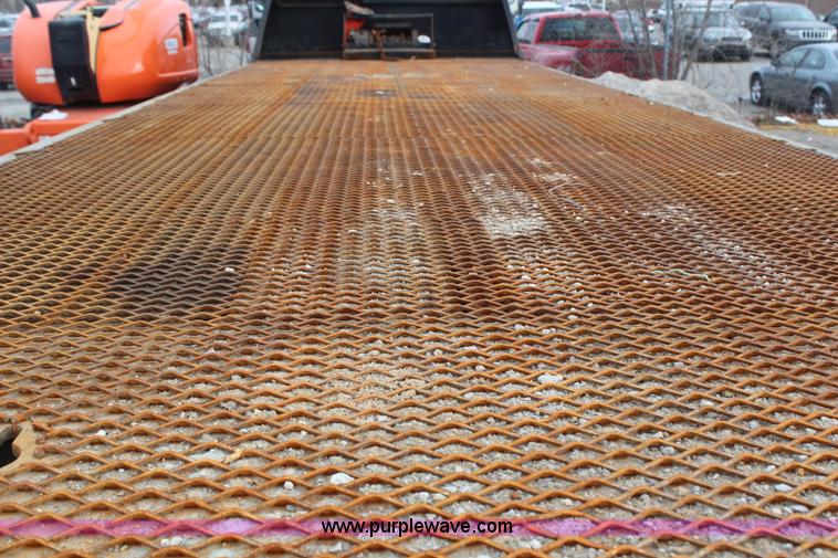 image for item H1377 2007 Freightliner Business Class M2 rollback truck