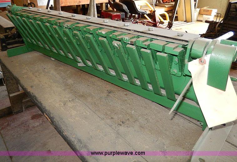 image for item AU9780 Work bench with metal brake and tin knocker