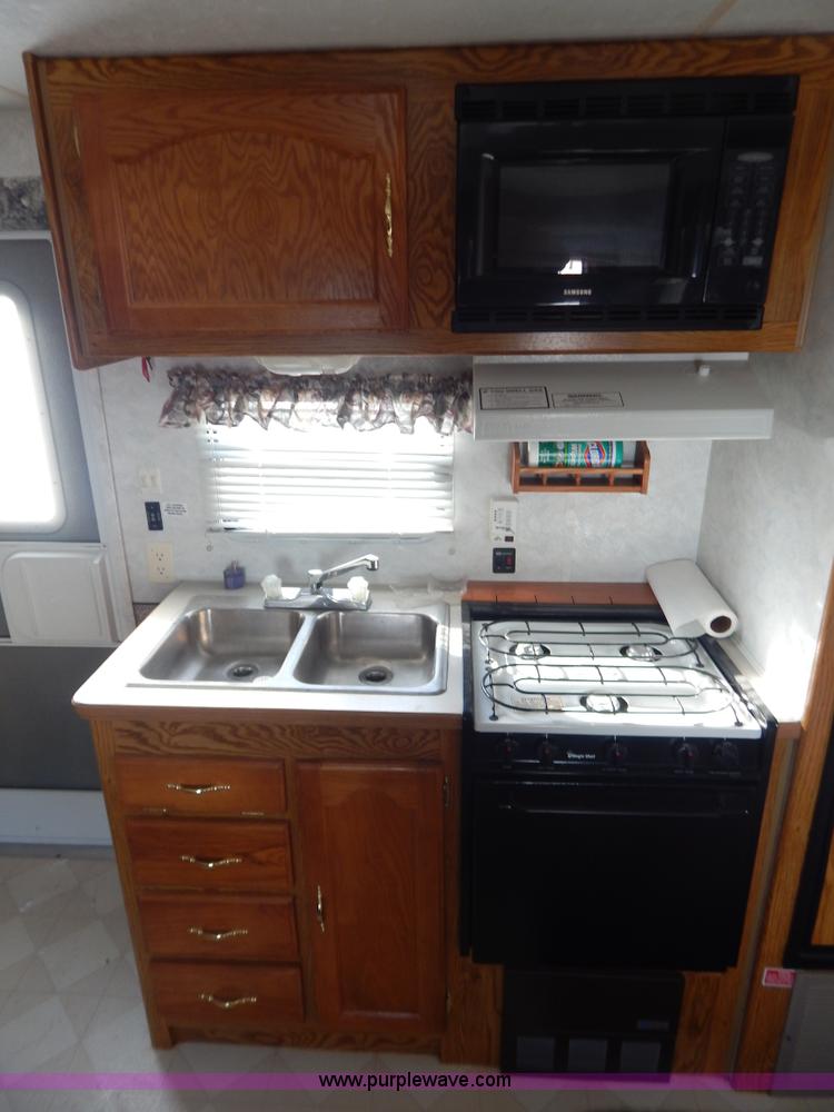 image for item H3814 1999 Sportsmen fifth wheel camper