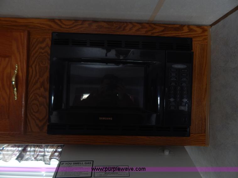 image for item H3814 1999 Sportsmen fifth wheel camper