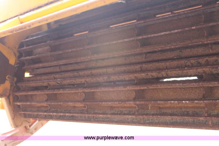 image for item C3710 2006 New Holland HW365 swather