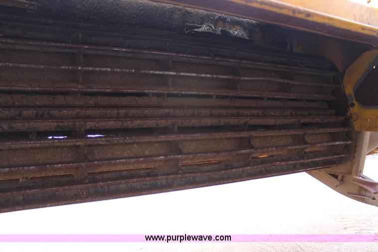 image for item C3710 2006 New Holland HW365 swather