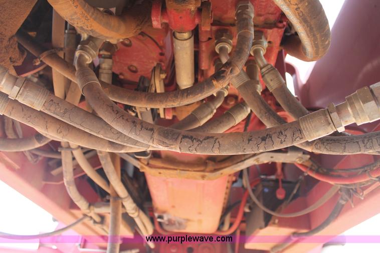 image for item C3710 2006 New Holland HW365 swather