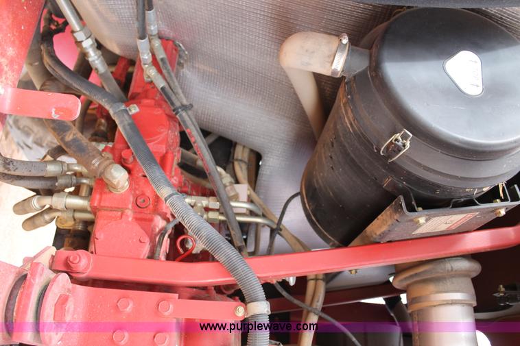 image for item C3710 2006 New Holland HW365 swather