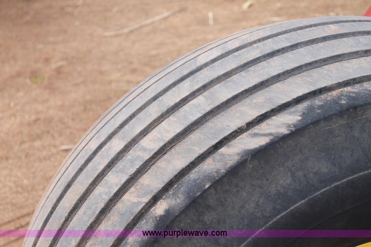 image for item C3710 2006 New Holland HW365 swather