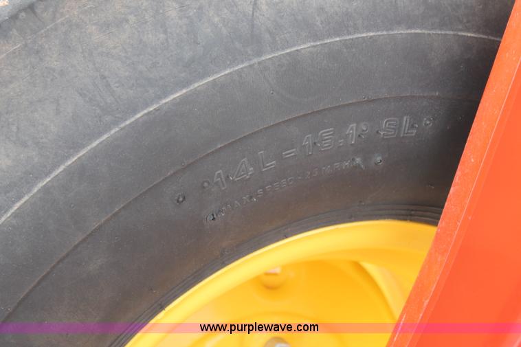 image for item C3710 2006 New Holland HW365 swather