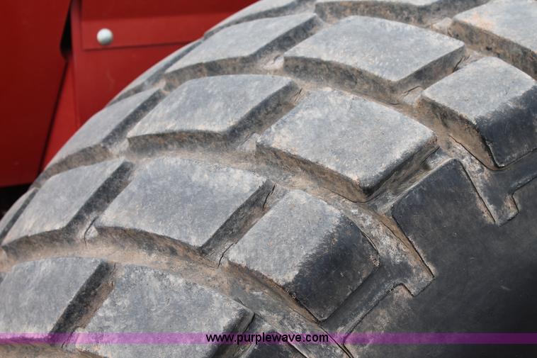 image for item C3710 2006 New Holland HW365 swather