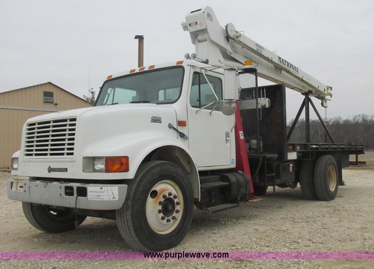 image for item AB9286 2000 International 4700 crane truck