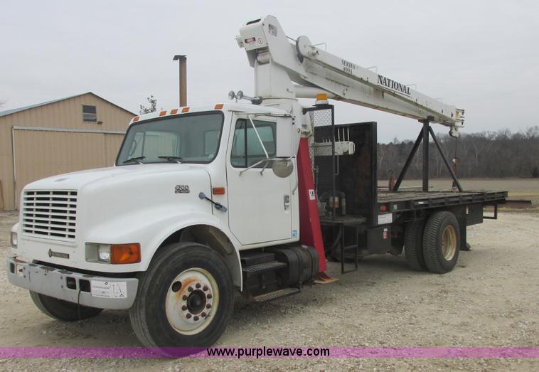 image for item AB9286 2000 International 4700 crane truck