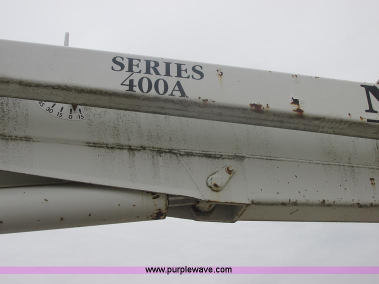 image for item AB9286 2000 International 4700 crane truck