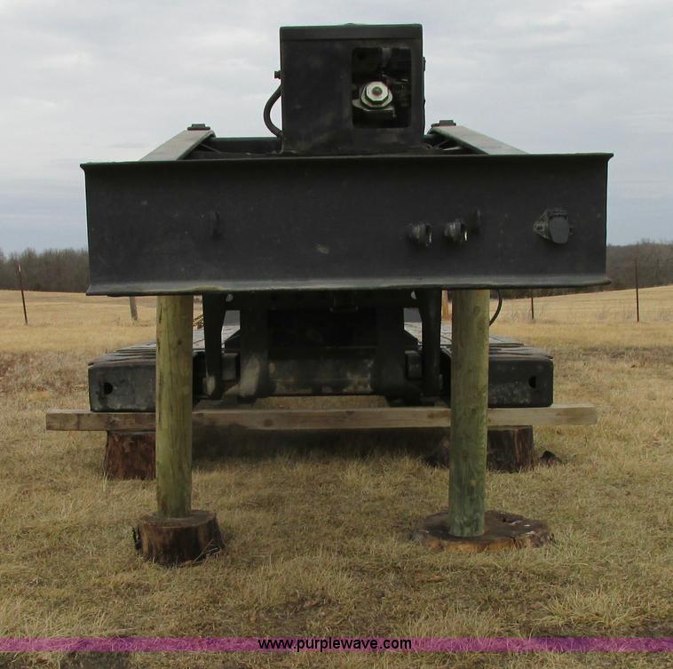 image for item F4857 2001 Fontaine TL50NEB triple axle trailer with stinger