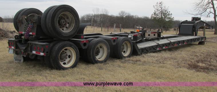 image for item F4857 2001 Fontaine TL50NEB triple axle trailer with stinger