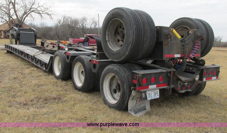 image for item F4857 2001 Fontaine TL50NEB triple axle trailer with stinger