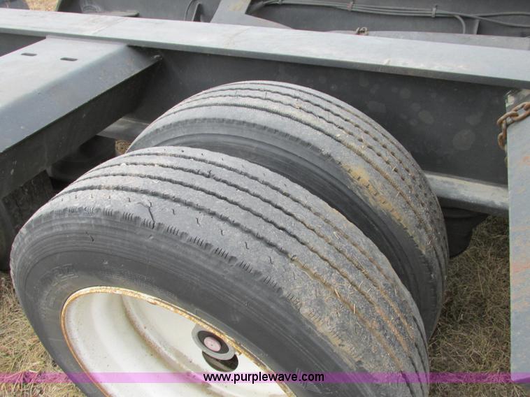 image for item F4857 2001 Fontaine TL50NEB triple axle trailer with stinger