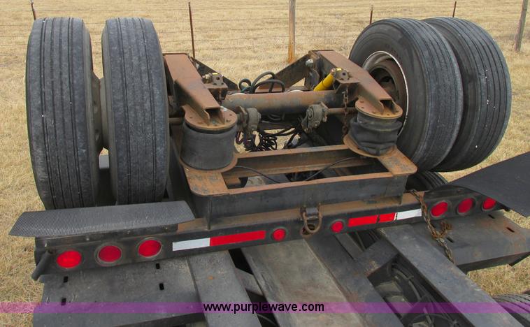image for item F4857 2001 Fontaine TL50NEB triple axle trailer with stinger