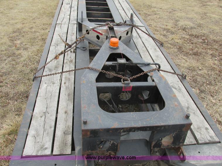 image for item F4857 2001 Fontaine TL50NEB triple axle trailer with stinger