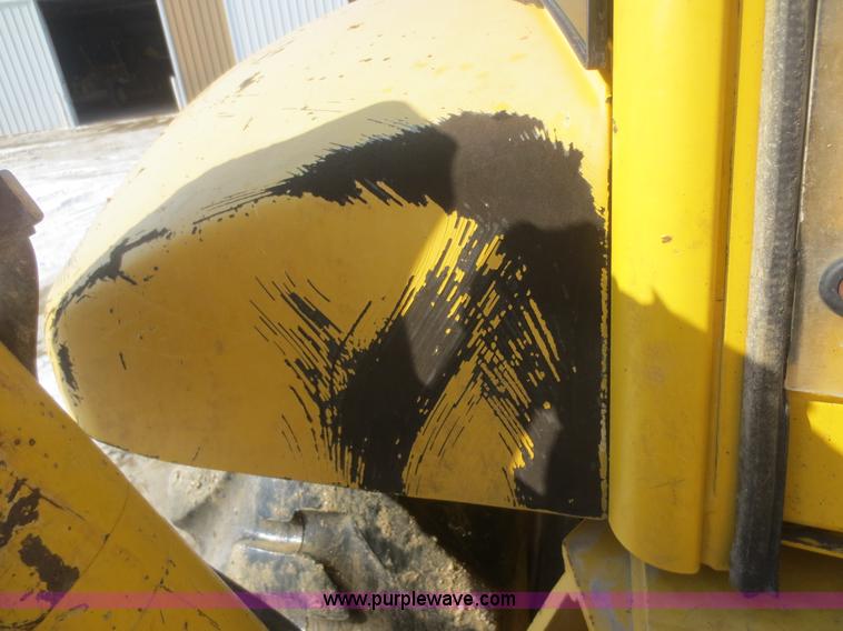 image for item F6753 2003 Komatsu 150 utility backhoe