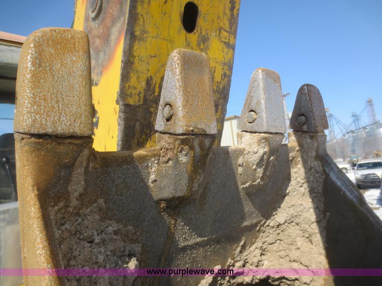 image for item F6753 2003 Komatsu 150 utility backhoe