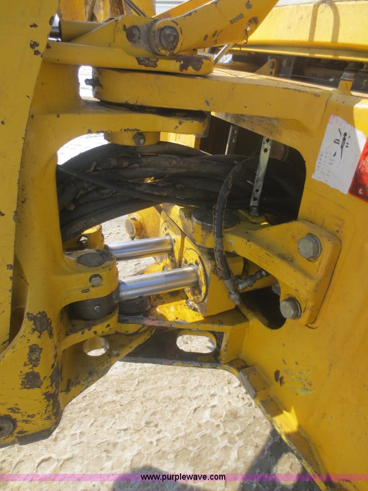 image for item F6753 2003 Komatsu 150 utility backhoe