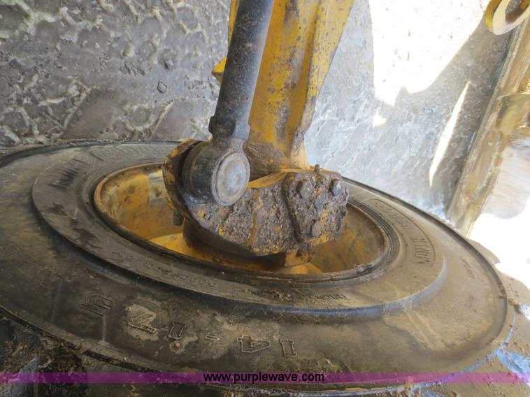 image for item F6753 2003 Komatsu 150 utility backhoe