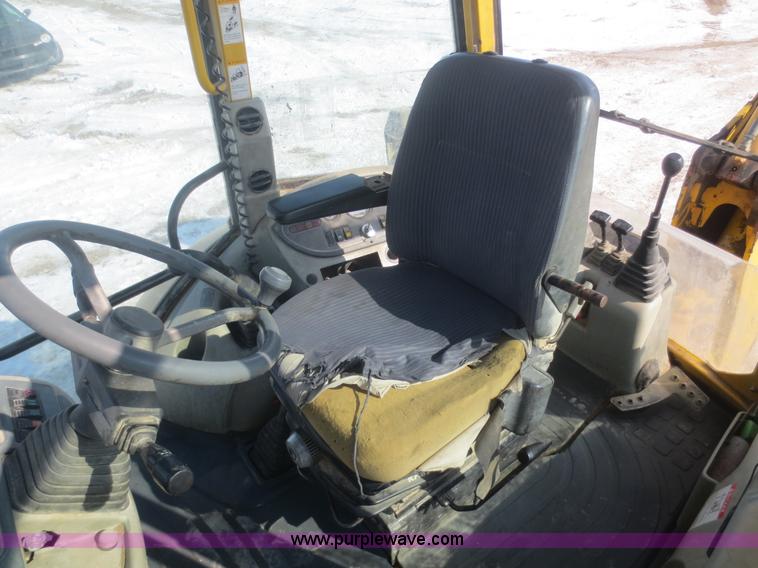 image for item F6753 2003 Komatsu 150 utility backhoe