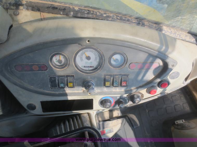 image for item F6753 2003 Komatsu 150 utility backhoe