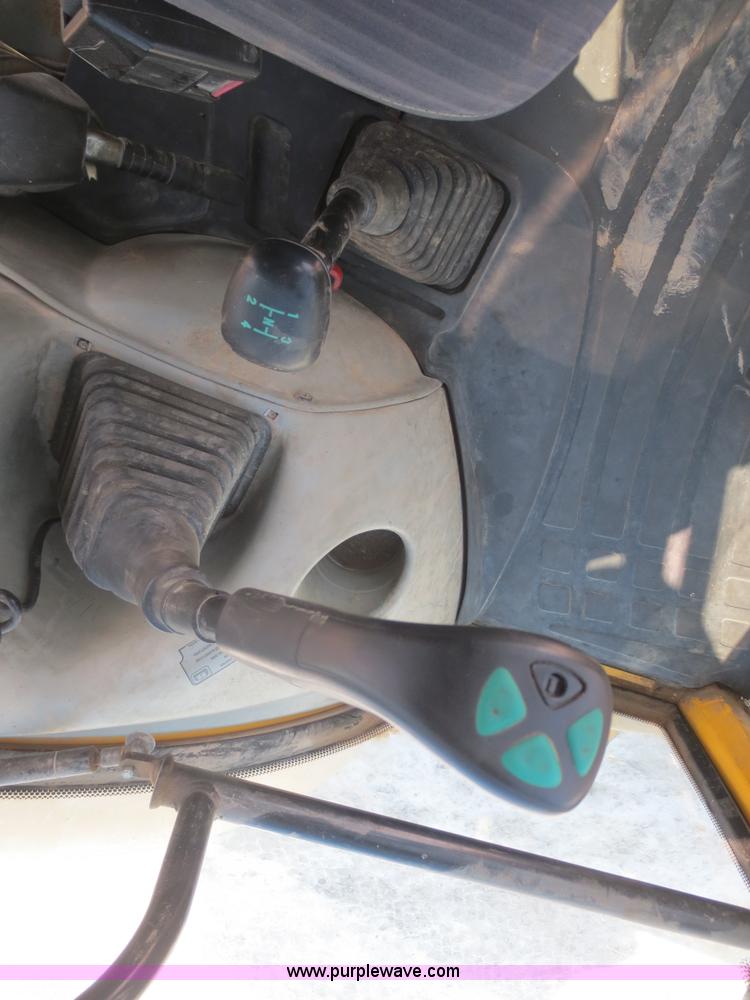 image for item F6753 2003 Komatsu 150 utility backhoe