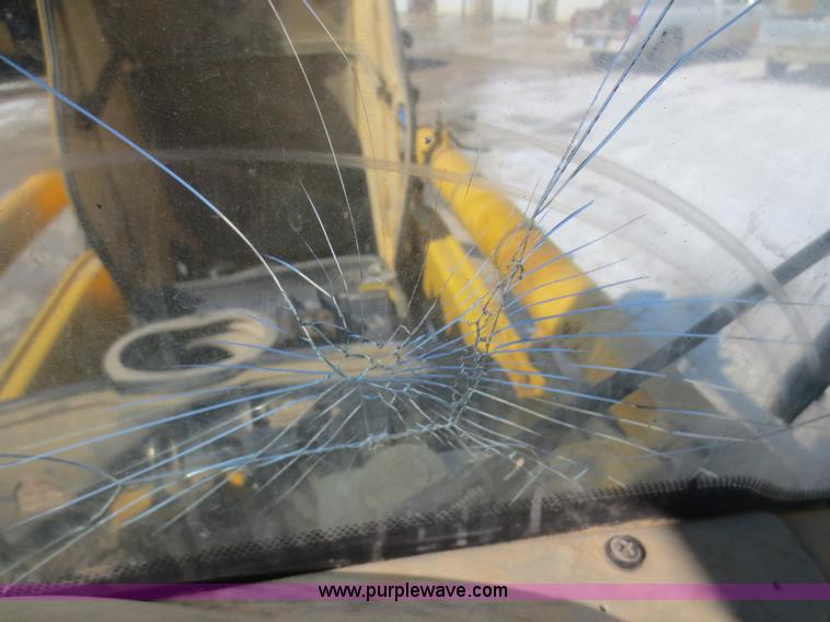 image for item F6753 2003 Komatsu 150 utility backhoe