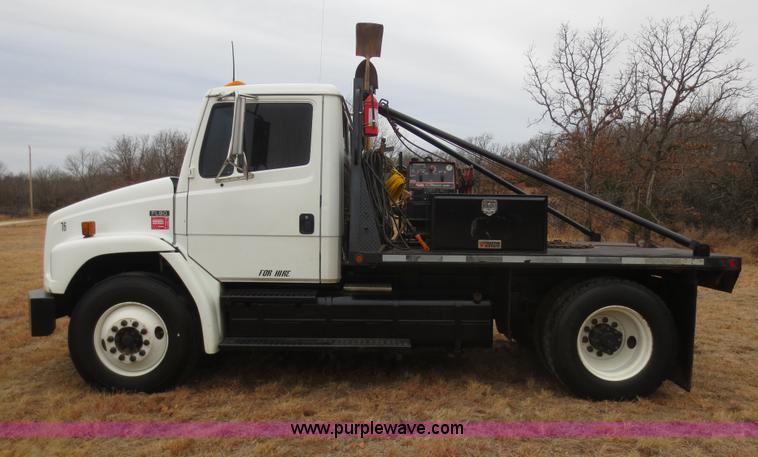 image for item F8139 1999 Freightliner FL80 winch truck