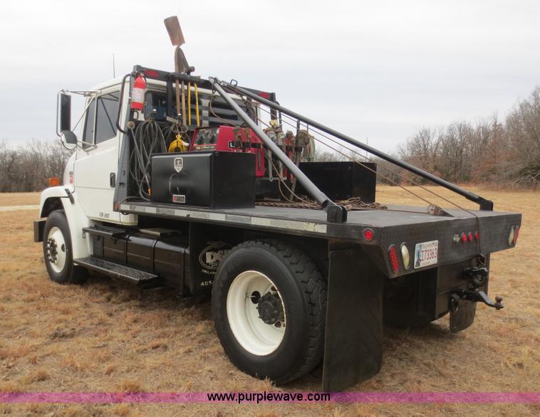 image for item F8139 1999 Freightliner FL80 winch truck