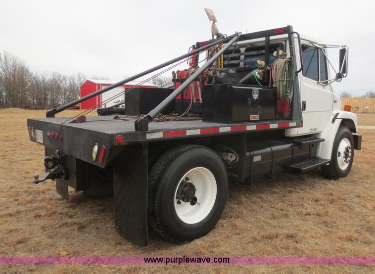 image for item F8139 1999 Freightliner FL80 winch truck