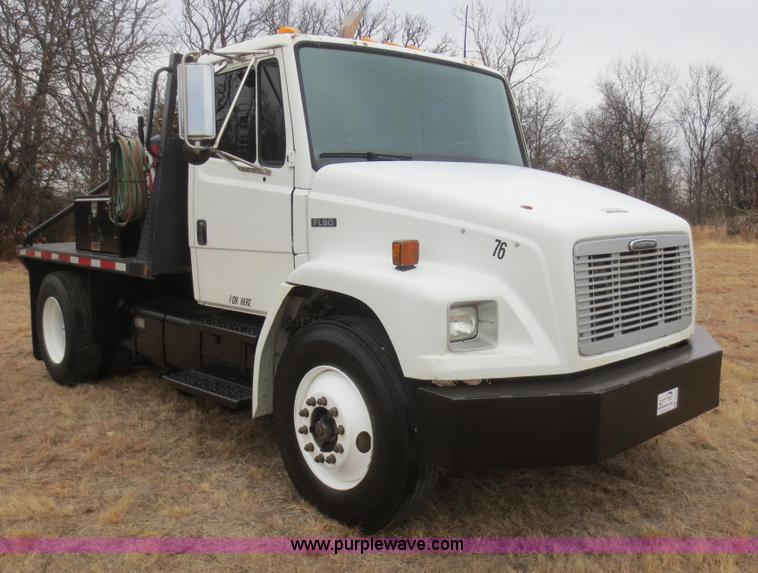 image for item F8139 1999 Freightliner FL80 winch truck