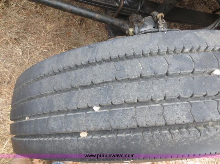 image for item F8139 1999 Freightliner FL80 winch truck