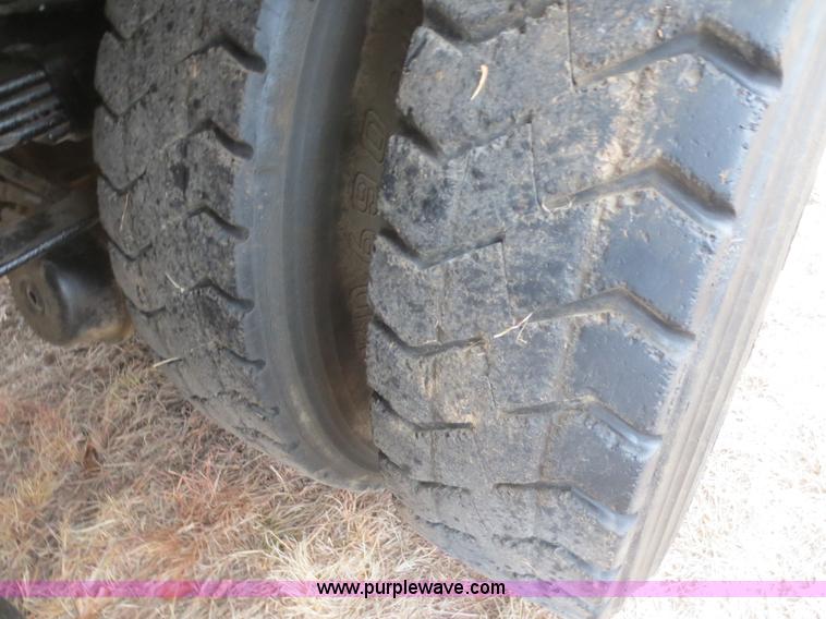 image for item F8139 1999 Freightliner FL80 winch truck