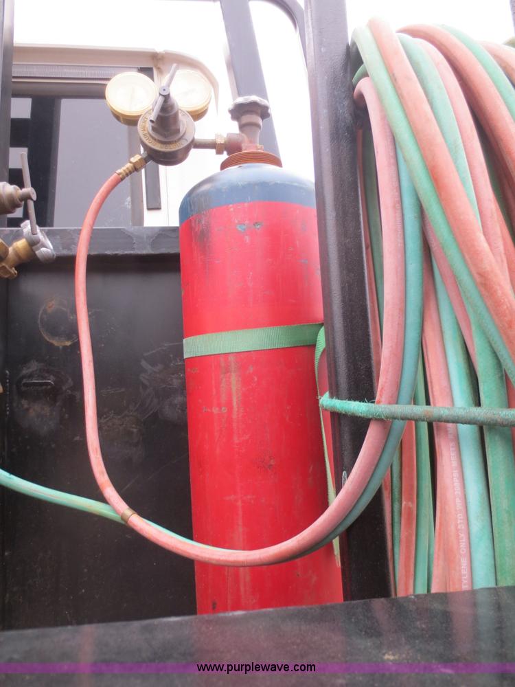 image for item F8139 1999 Freightliner FL80 winch truck