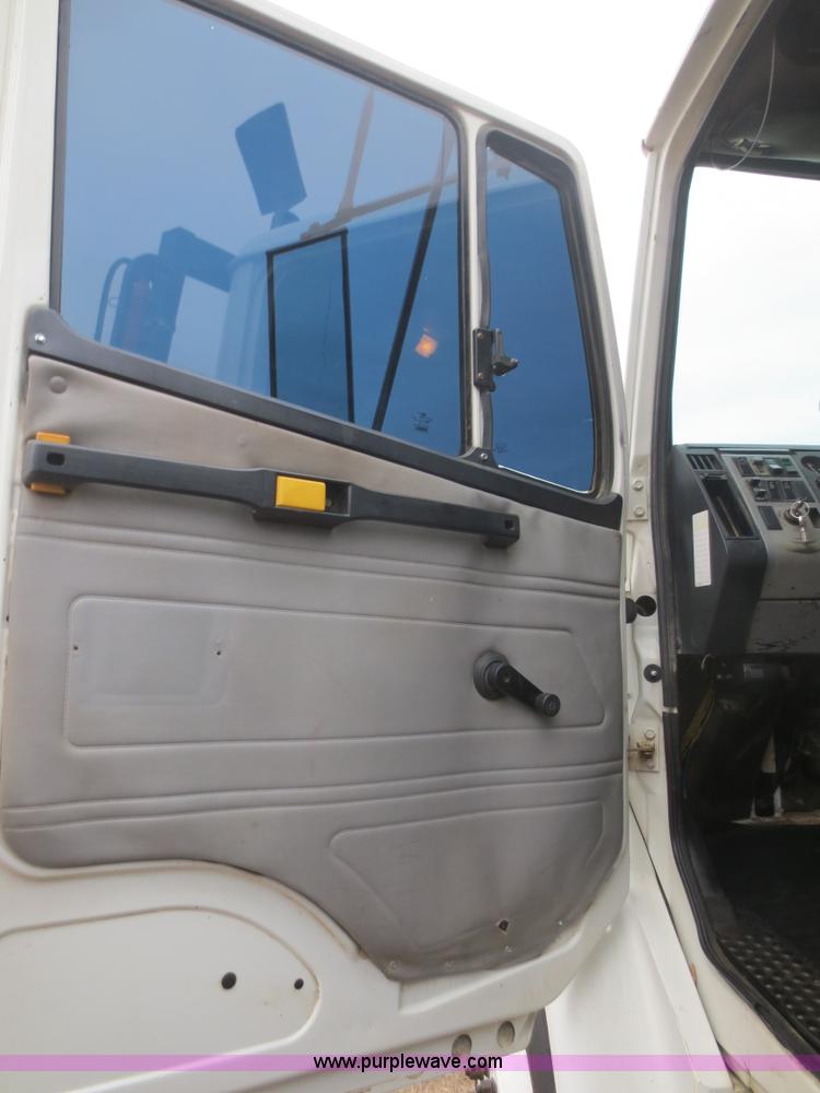 image for item F8139 1999 Freightliner FL80 winch truck