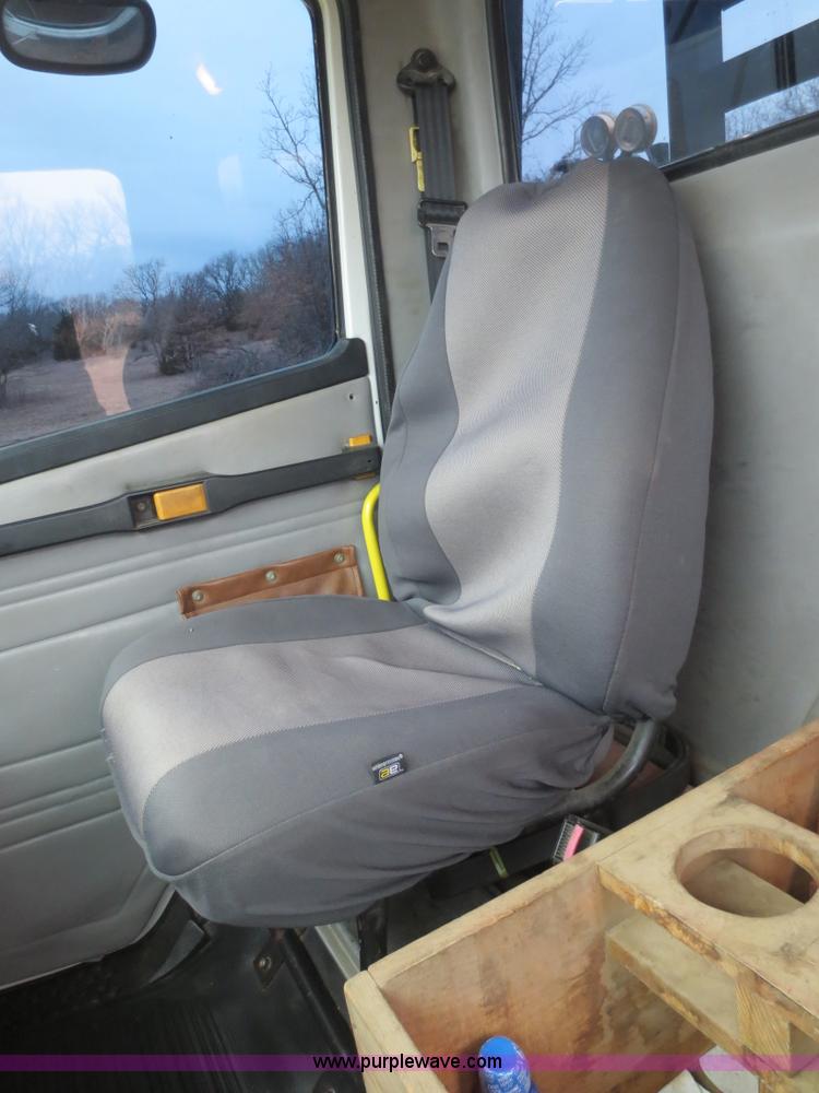 image for item F8139 1999 Freightliner FL80 winch truck