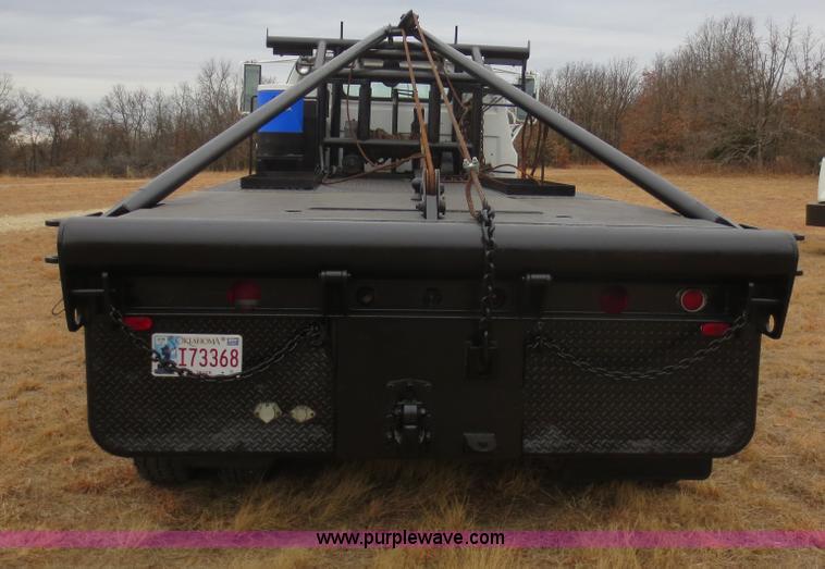 image for item F8140 1984 GMC TopKick winch truck