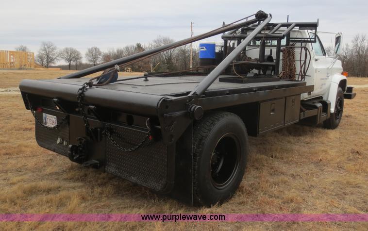 image for item F8140 1984 GMC TopKick winch truck