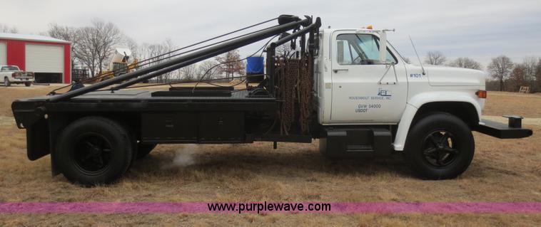 image for item F8140 1984 GMC TopKick winch truck