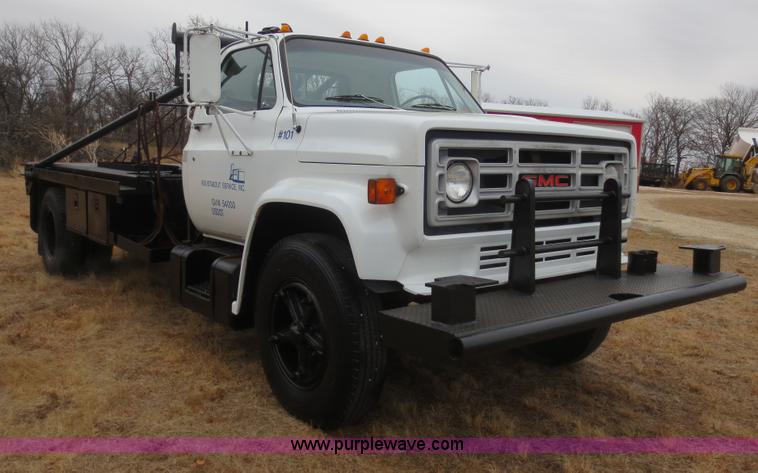 image for item F8140 1984 GMC TopKick winch truck