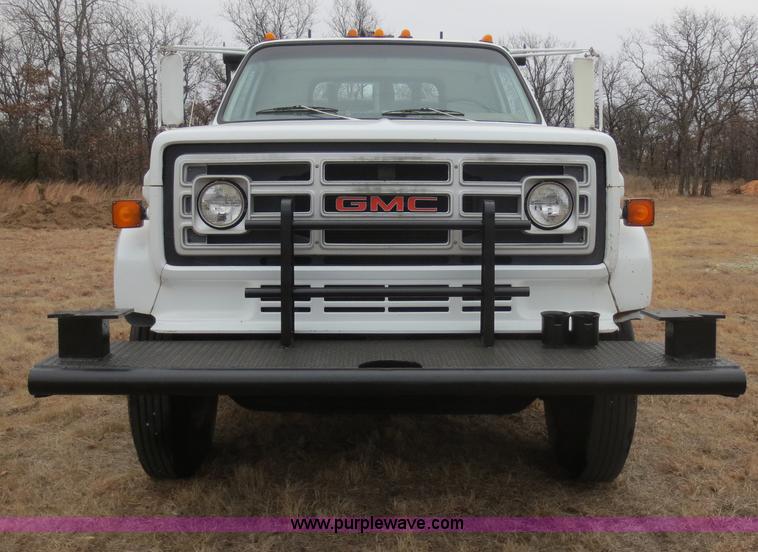 image for item F8140 1984 GMC TopKick winch truck