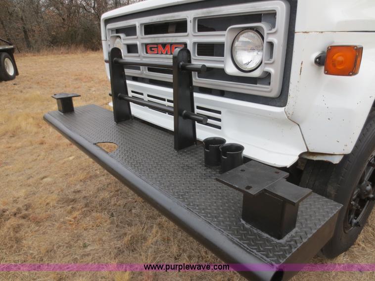 image for item F8140 1984 GMC TopKick winch truck