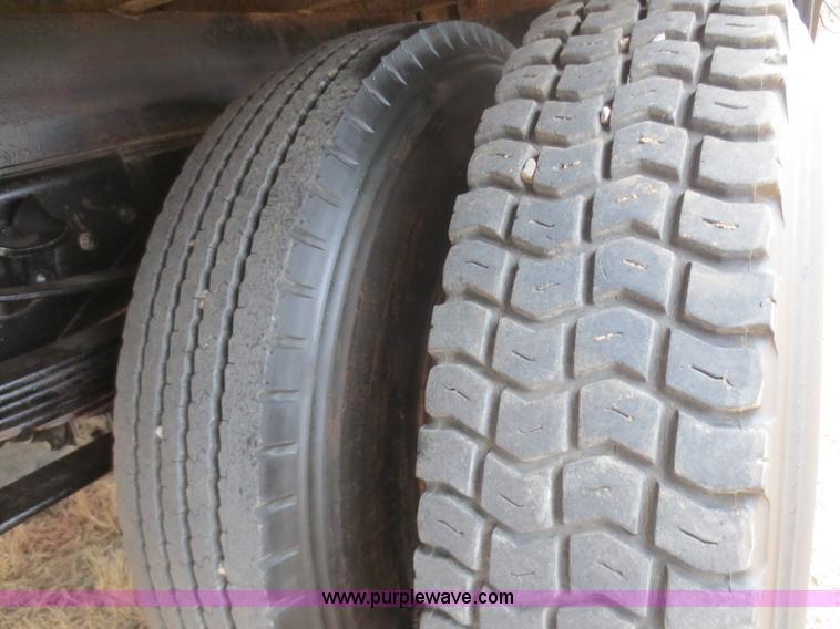 image for item F8140 1984 GMC TopKick winch truck