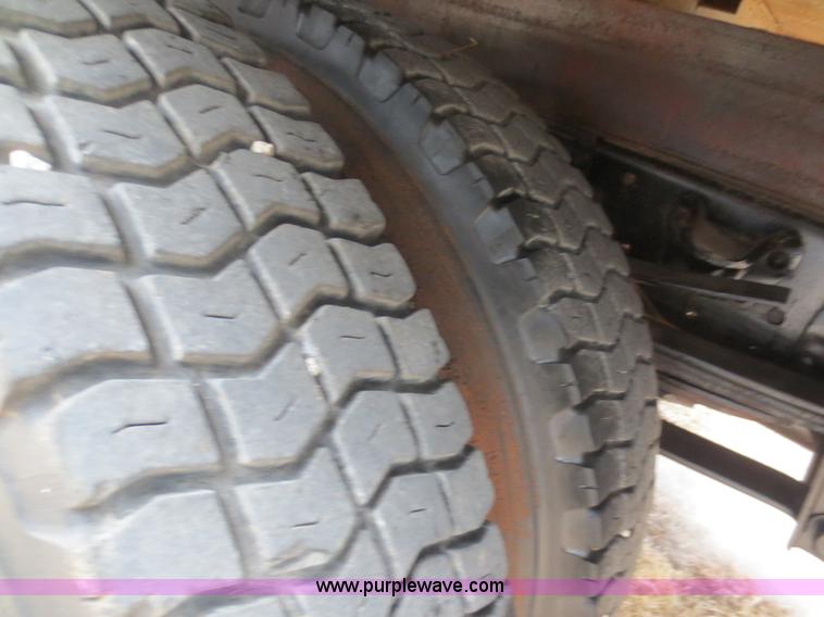 image for item F8140 1984 GMC TopKick winch truck