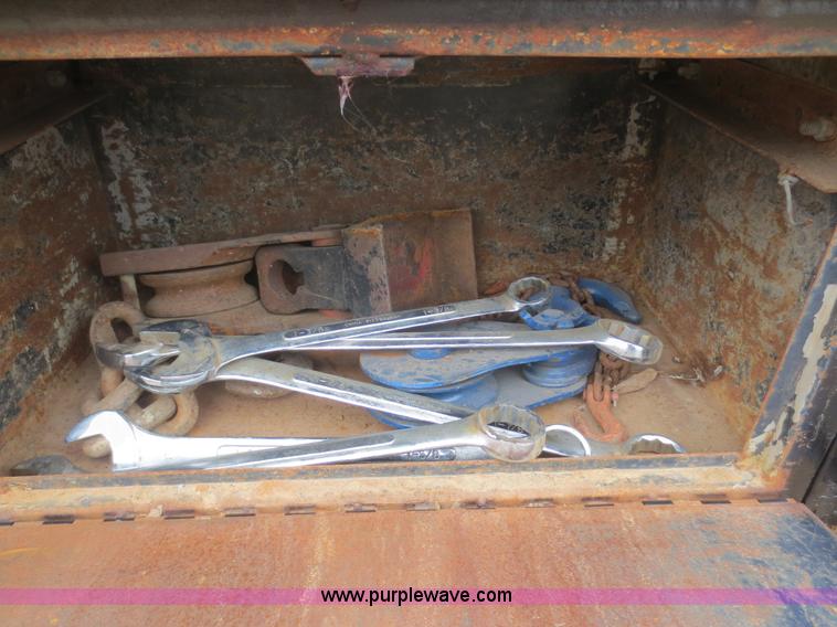 image for item F8140 1984 GMC TopKick winch truck