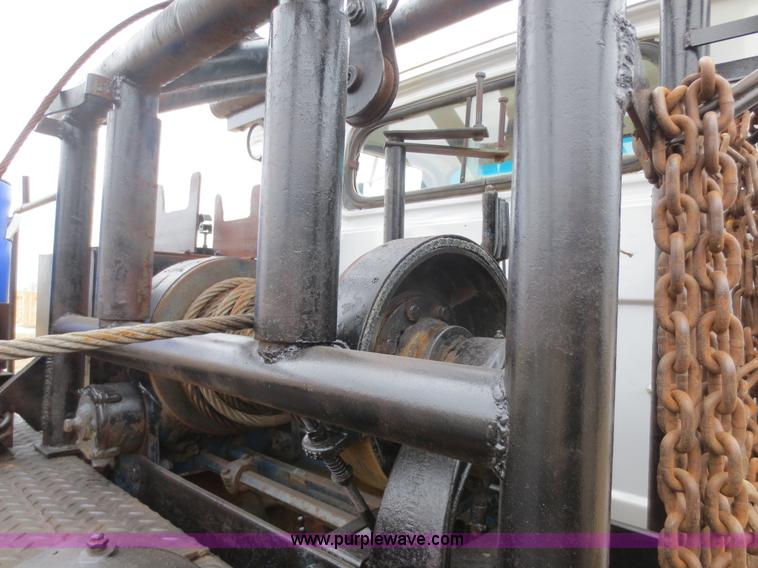 image for item F8140 1984 GMC TopKick winch truck