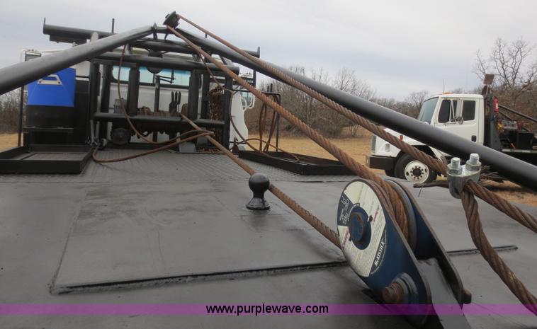 image for item F8140 1984 GMC TopKick winch truck