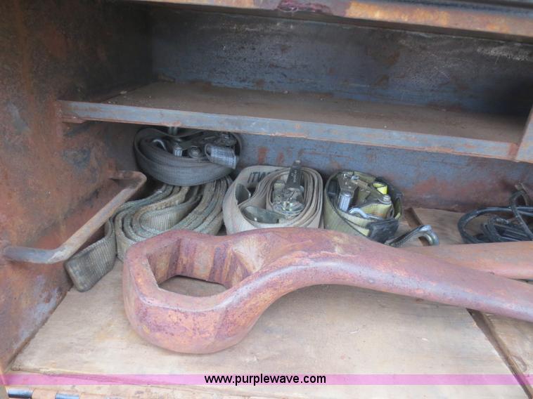 image for item F8140 1984 GMC TopKick winch truck